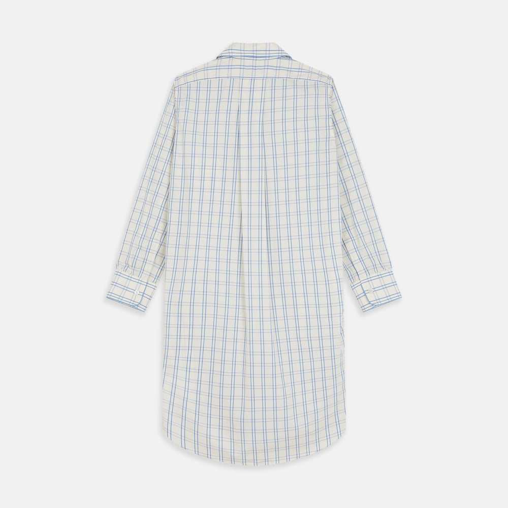 The Turnbull & Asser Cream Multi Cotton Sussex Nightshirt is a knee-length, long-sleeve shirt dress with a blue and beige plaid pattern, collar, front button placket, chest pocket, and rounded hem with side slits.