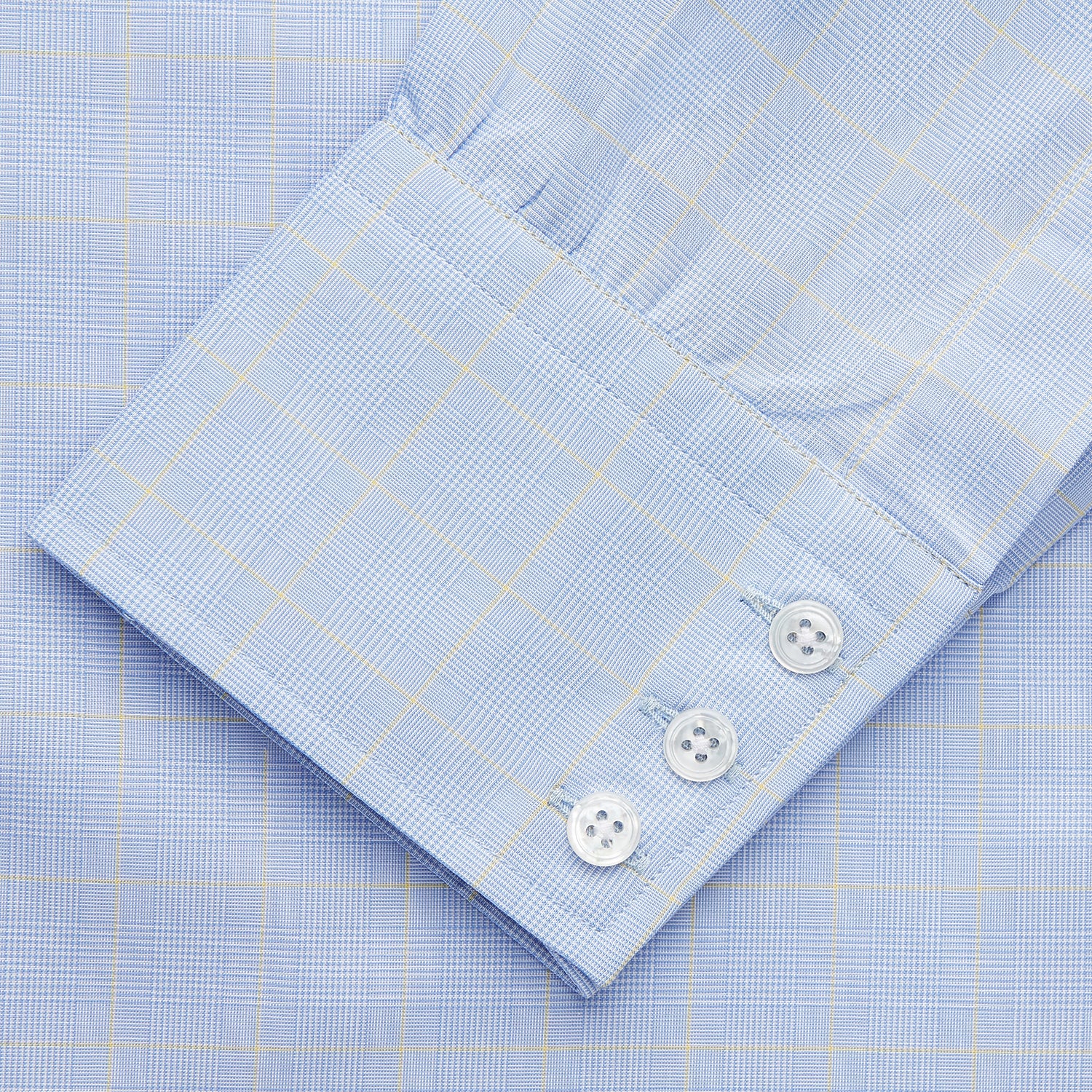 View 3 of product The Yellow and Blue Prince of Wales Check Belgravia Shirt by Turnbull & Asser features a classic collar, white buttons, long sleeves, and a checked pattern, displayed laid flat on a white background.