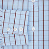 View 4 of product The Burgundy Multi Combination Check Mayfair Shirt by Turnbull & Asser features a classic check pattern and refined British craftsmanship, laid flat on a white background.