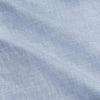 View 4 of product Turnbull & Asser’s Pale Blue Linen Blend Weekend Fit Unwin Shirt features long sleeves, a band collar, two chest pockets, and white buttons—ideal for casual summer wear.