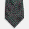 View 3 of product The Forest Green and Red Weave Patterned Silk Tie by Turnbull & Asser features a geometric interlocking design in red, blue, and green, elegantly rolled on a white background.