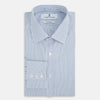 View 5 of product The Turnbull & Asser Blue Shadow Stripe Mayfair Shirt is a long-sleeve button-up with a T&A collar and thin blue vertical stripes on white, shown on a plain white background.