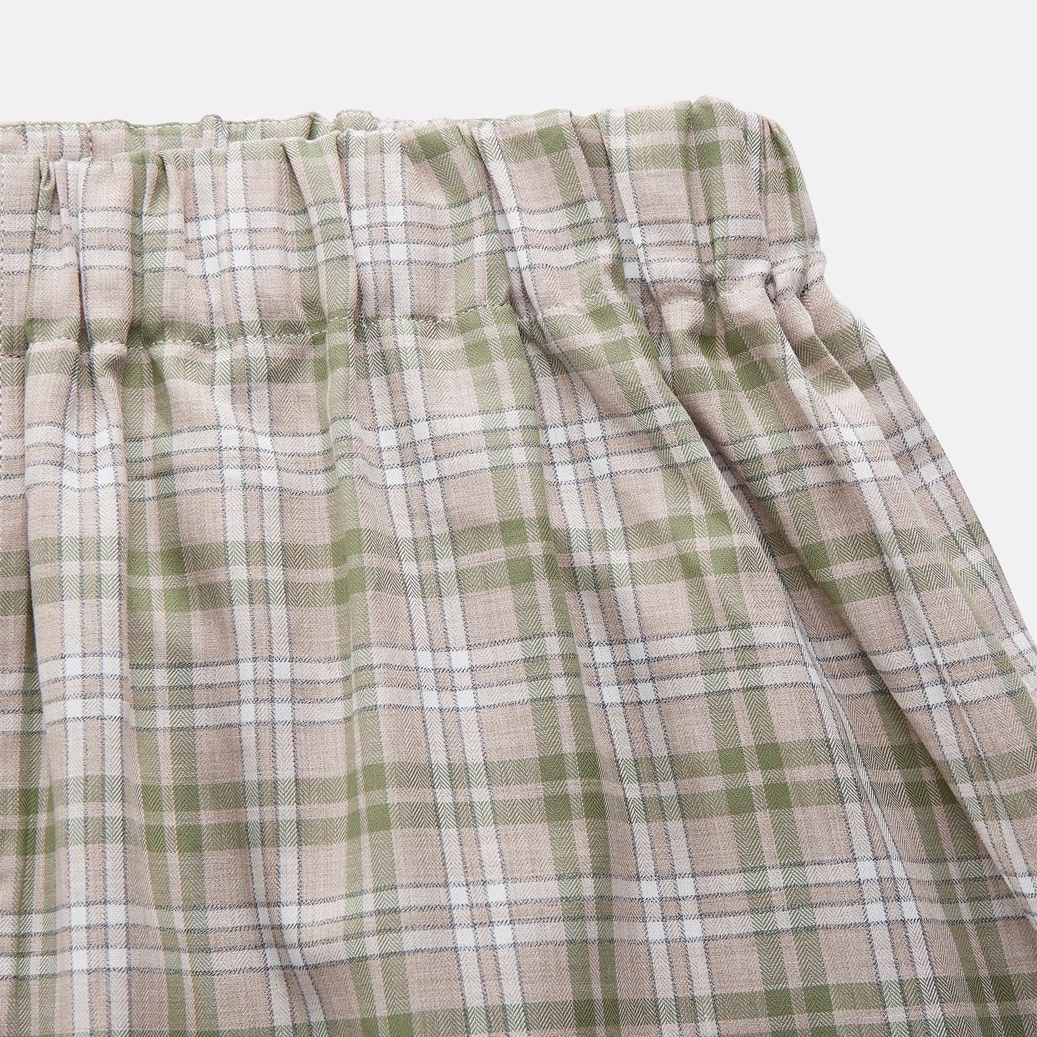 View 2 of product Turnbull & Asser Green Multi Check Cotton Hastings Pyjama Trousers—loose-fit with elasticated drawstring waist, featuring a brown, green, and white plaid pattern. Shown flat on a white background.