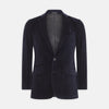 View 1 of product The Turnbull & Asser Navy Velvet Jacket features a classic fit, single-breasted style, notched lapels, two flap pockets, chest pocket, and single button closure. Made in Italy; shown on a plain white background.