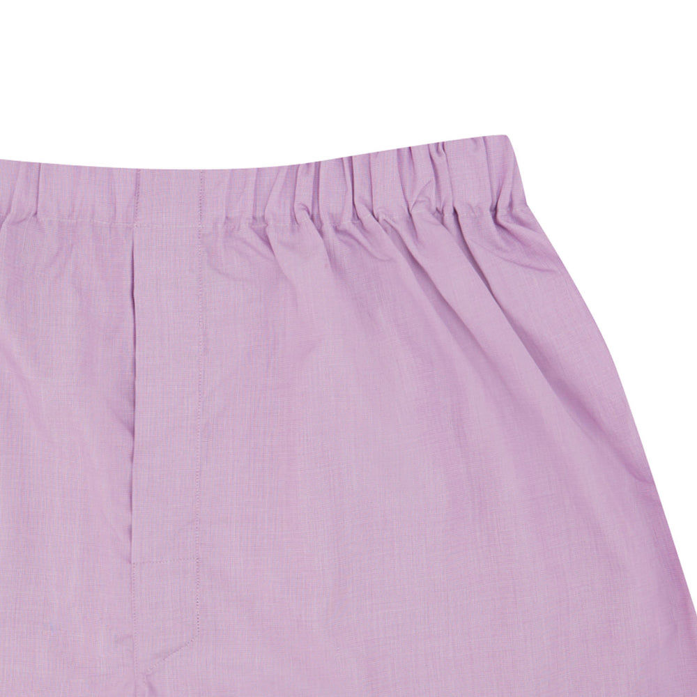 Turnbull & Asser Lilac End-On-End Cotton Boxer Shorts, featuring an elastic waistband and a relaxed, comfortable fit in solid light purple, are displayed against a plain white background. No visible patterns or extra details.