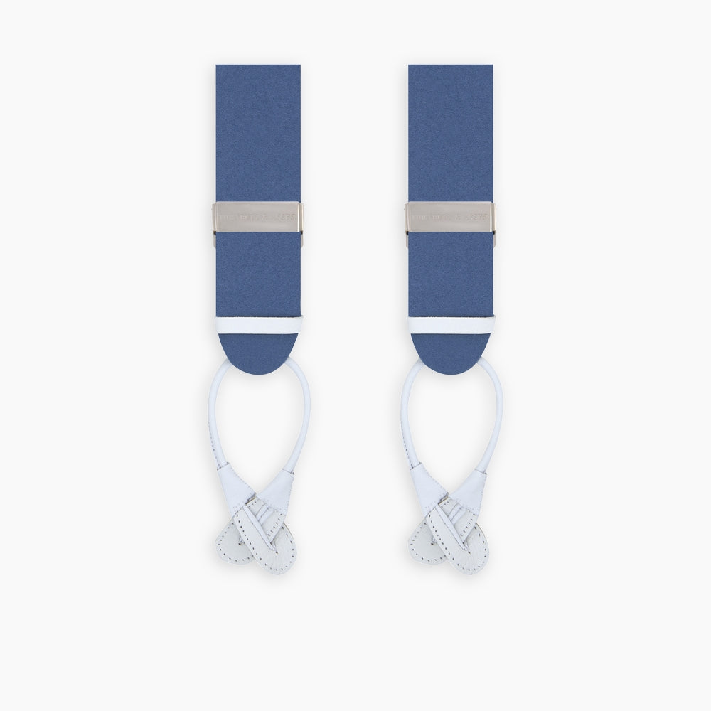 Turnbull & Asser Blue Adjustable Felt Braces with silver clasps and white leather ends, ideal for smart occasions, are shown side by side against a plain white background.