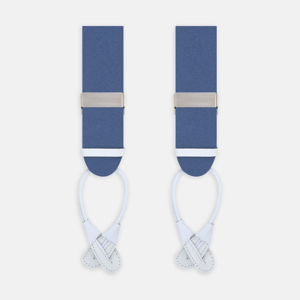 Turnbull & Asser Blue Adjustable Felt Braces with silver clasps and white leather ends, ideal for smart occasions, are shown side by side against a plain white background.
