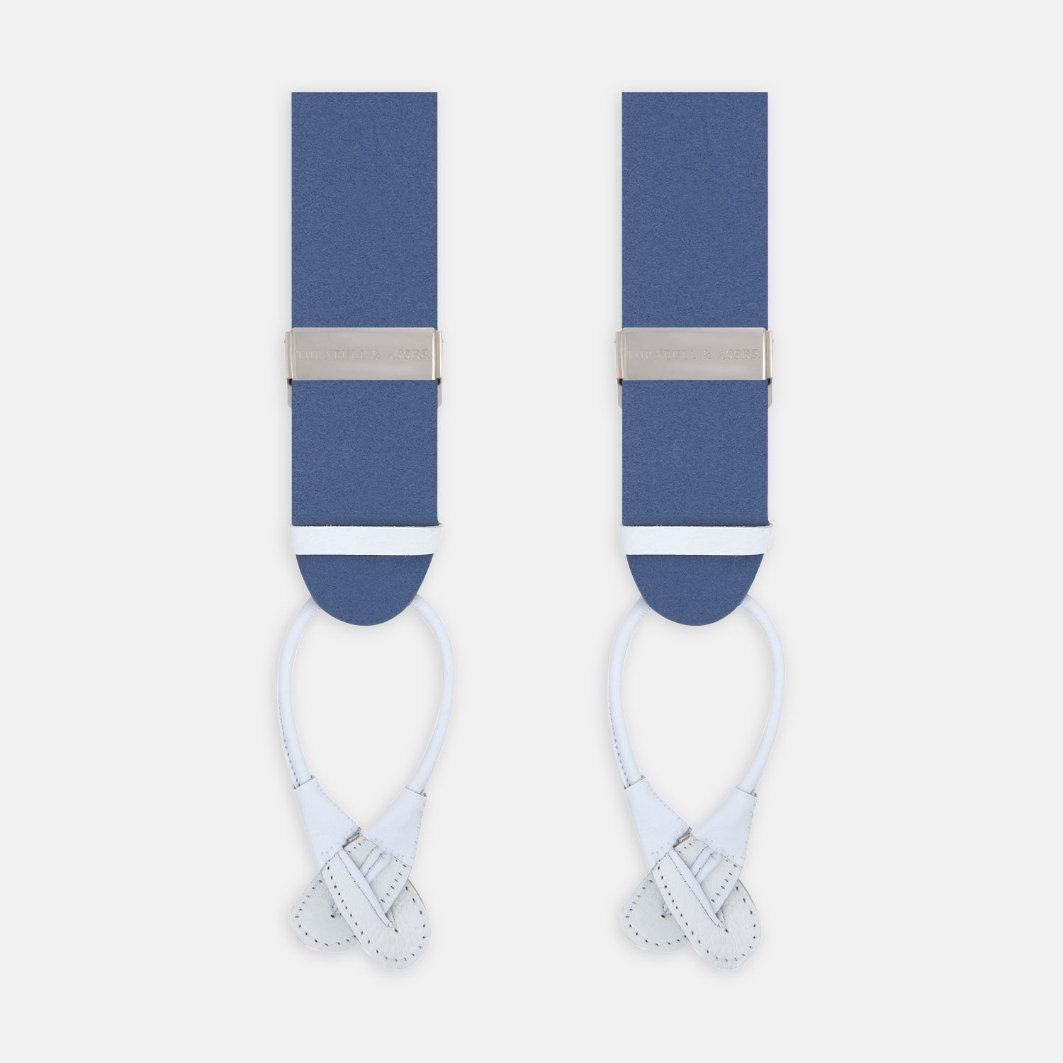 View 1 of product Turnbull & Asser Blue Adjustable Felt Braces with silver clasps and white leather ends, ideal for smart occasions, are shown side by side against a plain white background.