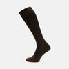 View 1 of product A single Brown Long Cotton Sock by Turnbull & Asser is shown on a neutral background, highlighting its knee-high length and ribbed design, crafted from premium Egyptian cotton.