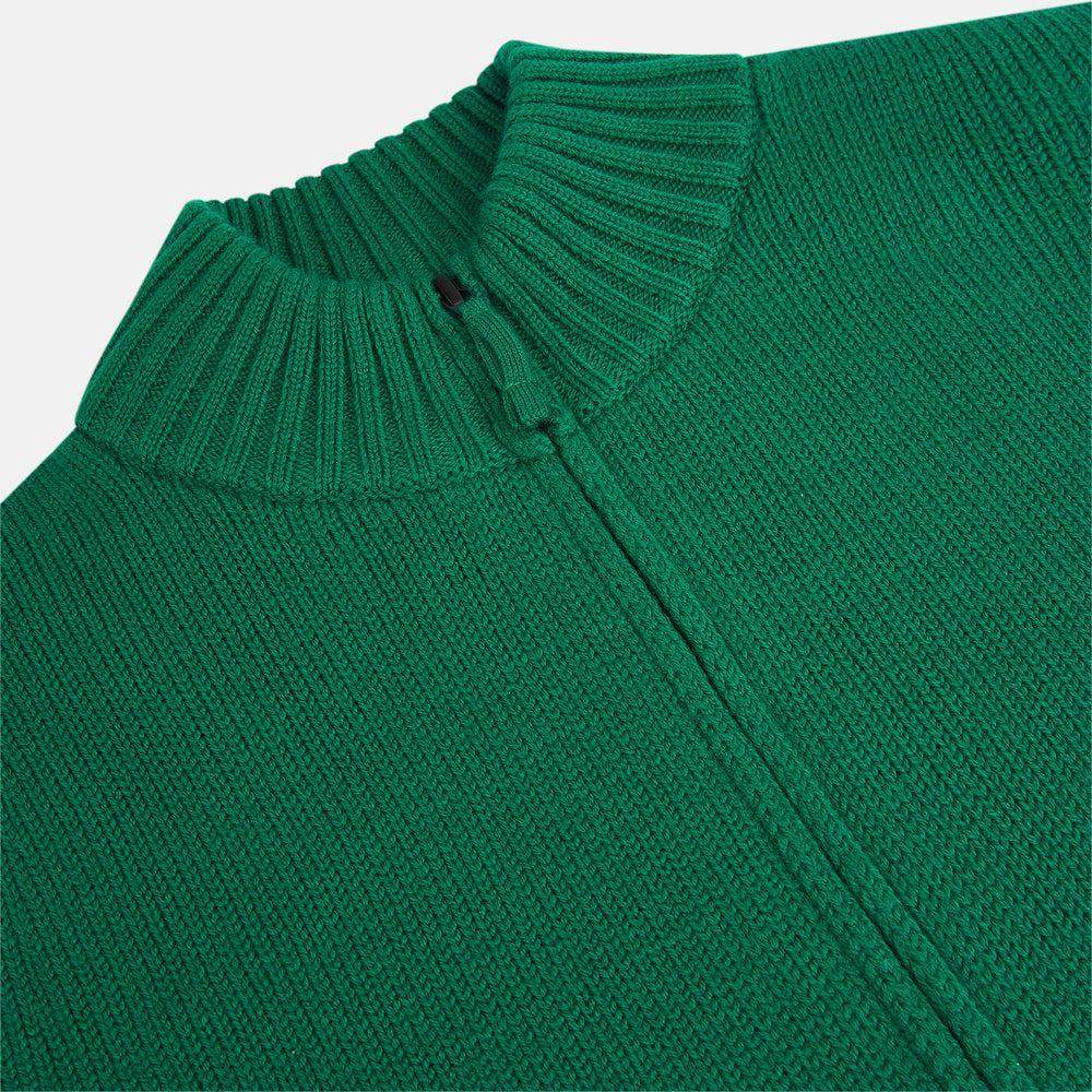 The Turnbull & Asser Forest Green Merino High Neck Zipped Cardigan features a ribbed collar, cuffs, and hem for classic style—this vibrant knitwear essential is shown against a white background.