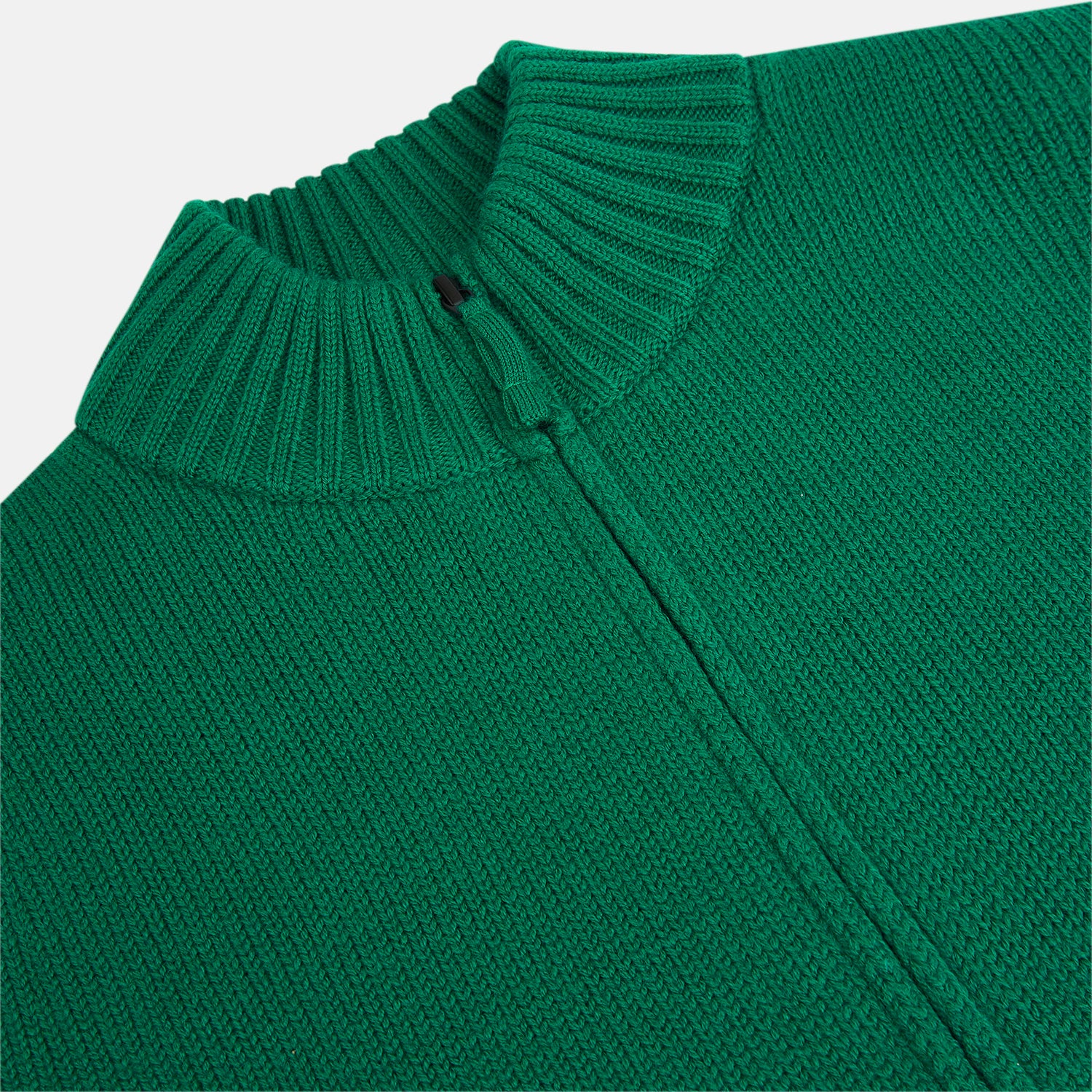 View 2 of product The Turnbull & Asser Forest Green Merino High Neck Zipped Cardigan features a ribbed collar, cuffs, and hem for classic style—this vibrant knitwear essential is shown against a white background.