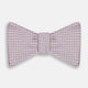 The Turnbull & Asser Pale Pink and White Square Silk Bow Tie features white stripes and subtle square patterns, ideal for formalwear. Shown on a white background.
