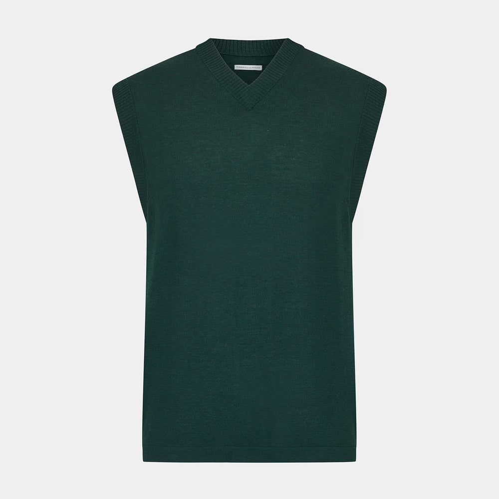 Turnbull & Asser's Petrol Green Fine Merino V-Neck Vest is shown from the front on a white background, highlighting its classic and simple sleeveless design.