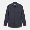 View 1 of product The Turnbull & Asser Navy Hampstead Overshirt features a collar, left chest pocket, two zippered pockets near the bottom, and a classic long-sleeve button-up design, shown laid flat on a white background.