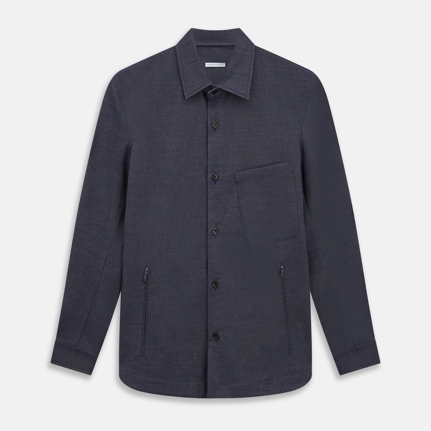 View 1 of product The Turnbull & Asser Navy Hampstead Overshirt features a collar, left chest pocket, two zippered pockets near the bottom, and a classic long-sleeve button-up design, shown laid flat on a white background.