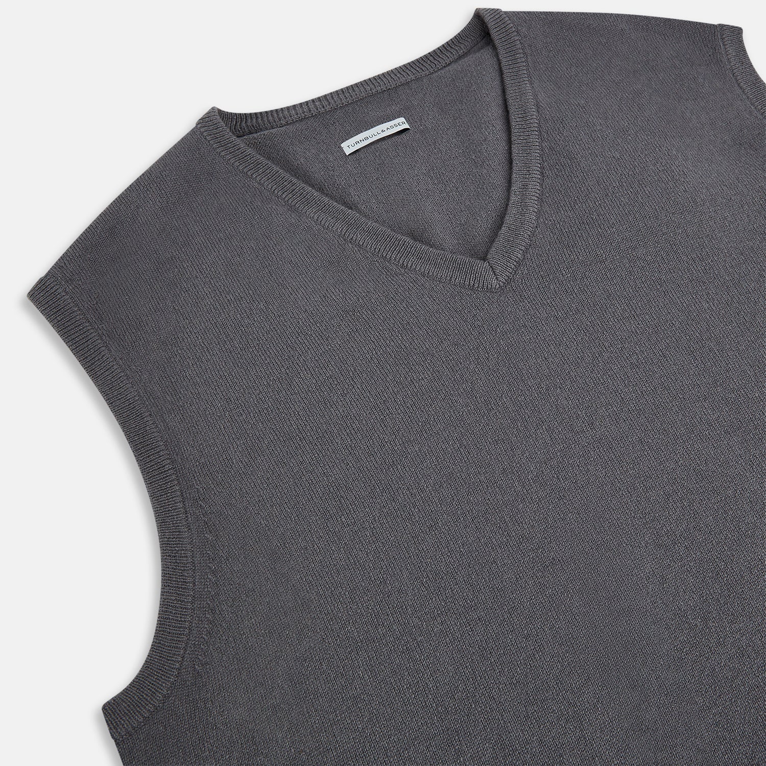 View 2 of product The Turnbull & Asser Slate Grey V-neck Cashmere Vest, shown against a white background, is a sophisticated sleeveless jumper ideal for refined ensembles.