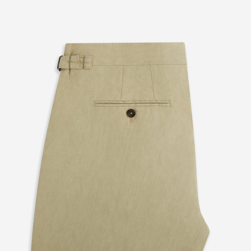 Turnbull & Asser's Taupe Linen Henry Trousers, made from a linen-cotton blend, feature a straight-leg cut, button and zip closure, belt loops, and adjustable waist tabs—shown against a plain white background.