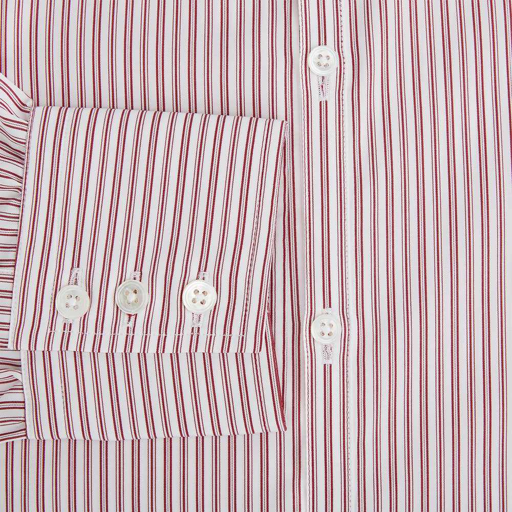 The Red Ticking Stripe Westminster Shirt by Turnbull & Asser features long sleeves, a button-up front, and vertical red and white stripes, shown flat on a white background.