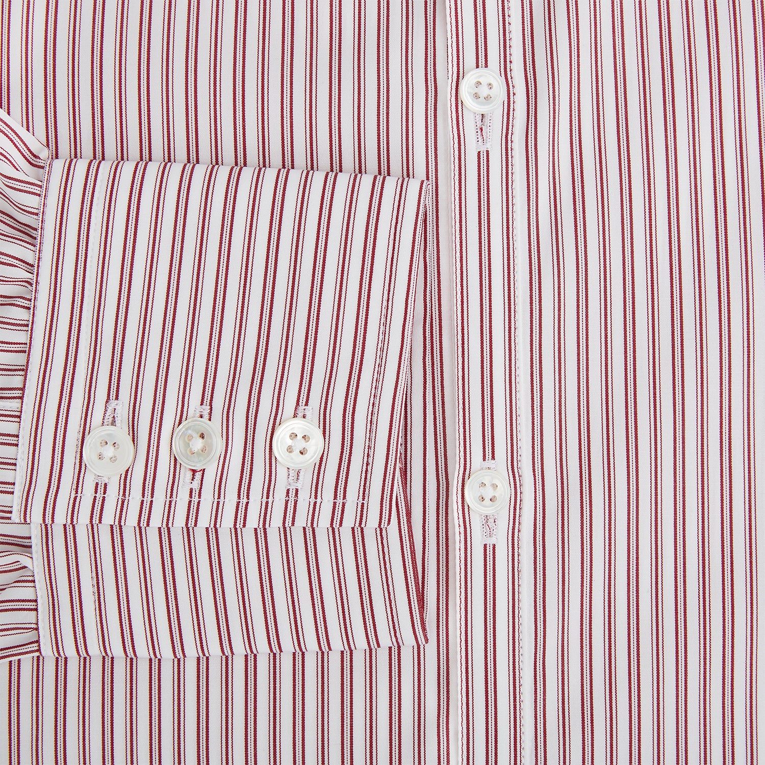 View 4 of product The Red Ticking Stripe Westminster Shirt by Turnbull & Asser features long sleeves, a button-up front, and vertical red and white stripes, shown flat on a white background.
