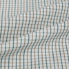 View 6 of product The Green and Brown Multi Check Mayfair Shirt by Turnbull & Asser, crafted from Italian cotton with a classic collar and buttoned cuffs, is laid flat on a white background.