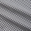 View 4 of product The Turnbull & Asser Grey Gingham Check Cotton Melange Regular Fit Mayfair Shirt, shown flat against a white background, offers a classic designer look with its small black and white check pattern and button-down design.