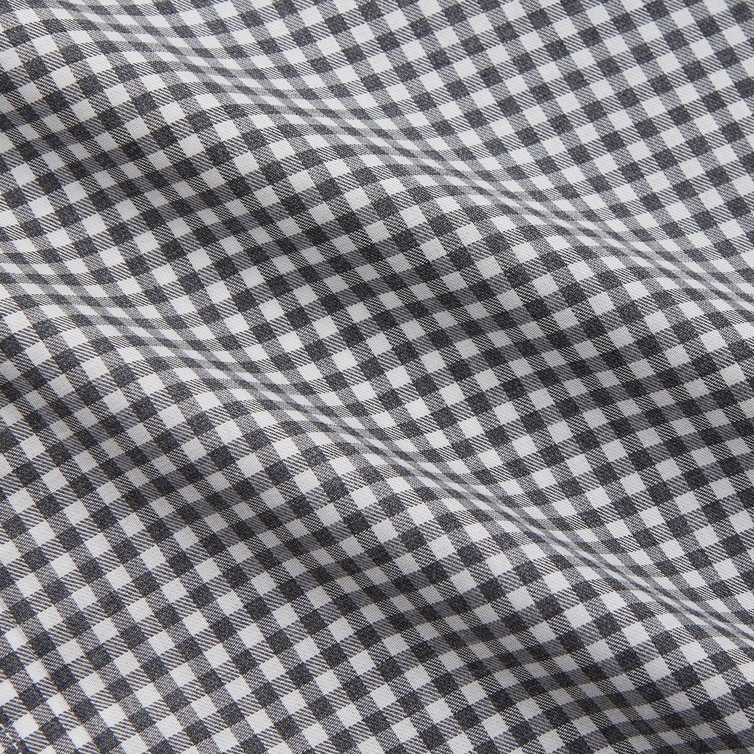 View 4 of product The Turnbull & Asser Grey Gingham Check Cotton Melange Regular Fit Mayfair Shirt, shown flat against a white background, offers a classic designer look with its small black and white check pattern and button-down design.