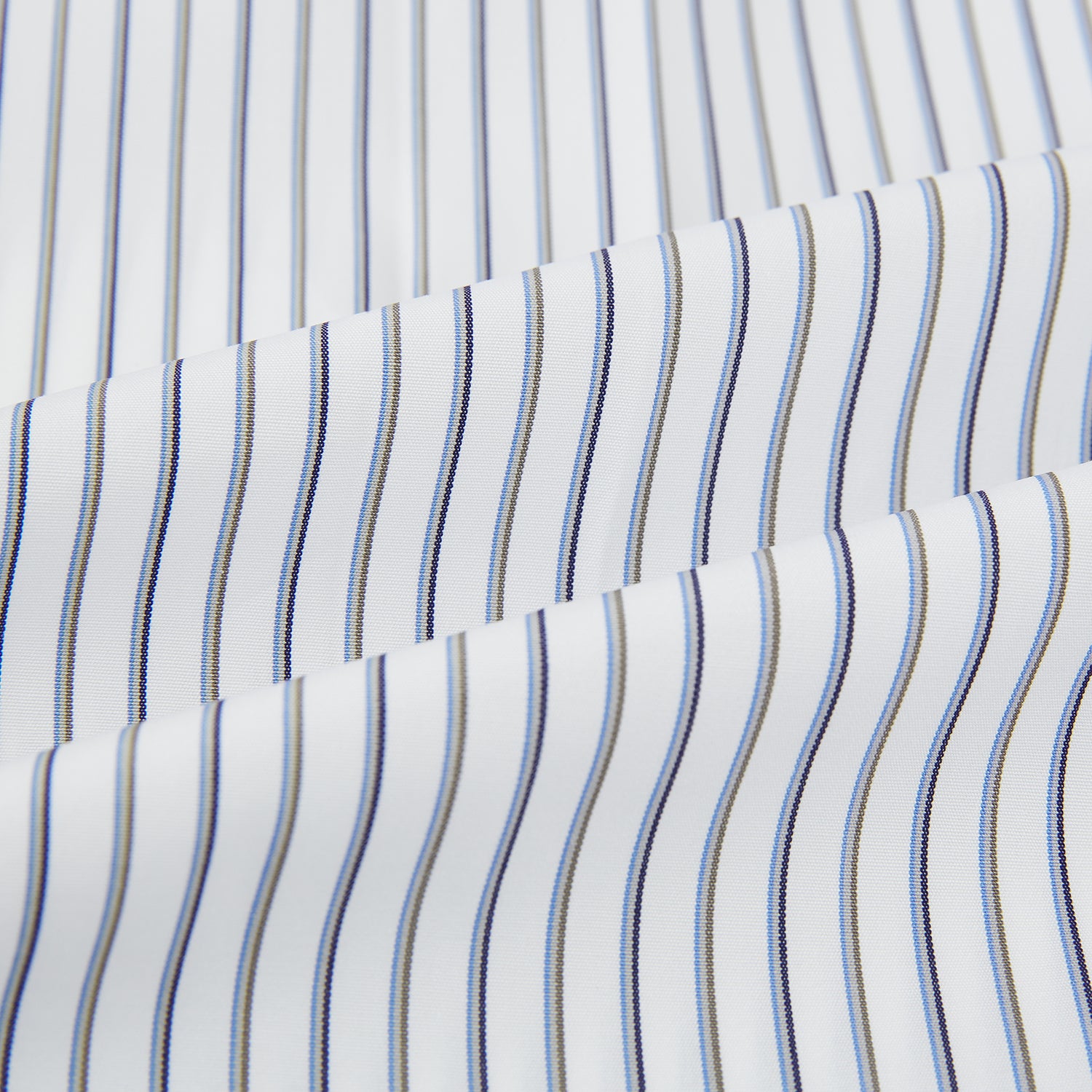 View 5 of product The Brown Multi Stripe Quarzo Nightshirt by Turnbull & Asser is a long-sleeve, knee-length Italian cotton nightshirt with brown and blue stripes, a collar, button placket, chest pocket, and cuffs. The dress is laid flat on a white background.