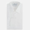 View 4 of product The Turnbull & Asser Plain White Cotton Shirt features a T&A collar and double cuffs, shown flat on a white background—ideal for pairing with standout ties or achieving a minimalist look.