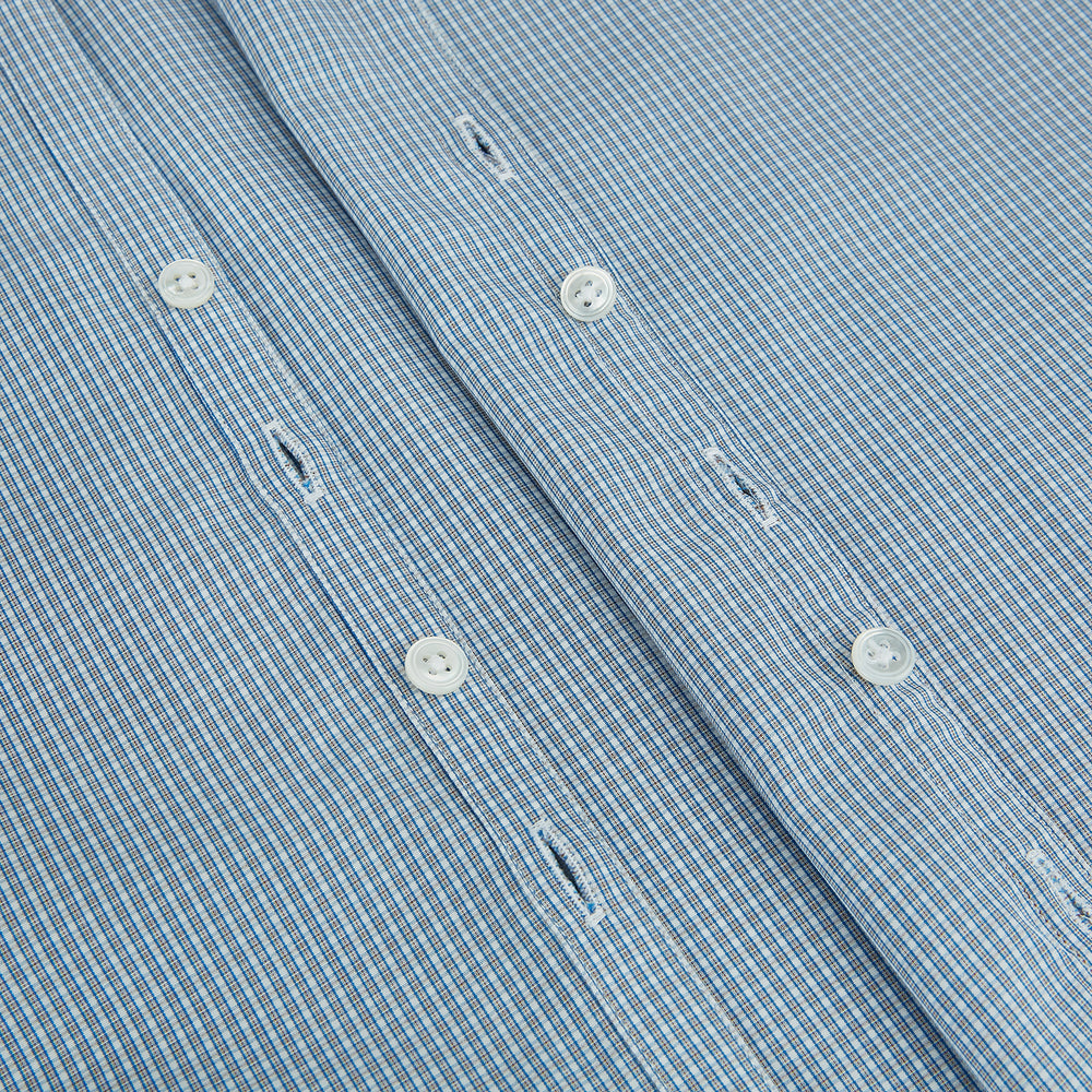 The Turnbull & Asser Blue and Brown Micro Shadow Check Westminster Shirt features a refined collar and white buttons, showcasing timeless British craftsmanship.