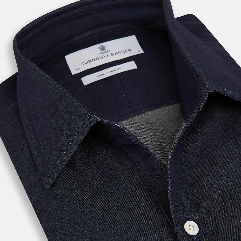 The Navy Piccadilly Shirt from Turnbull & Asser, featuring buttons, is ideal for both casual and formal occasions.
