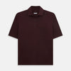 View 1 of product The Turnbull & Asser Burgundy Polo Shirt is crafted from soft cotton jersey with short sleeves, a classic collar, three front buttons, and a small buttoned chest pocket, shown flat on a white background.