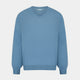 The Turnbull & Asser Pale Blue Fine Merino V-Neck Jumper features long sleeves, ribbed cuffs, and a straight hem. Shown against a white background, this classic knitwear combines comfort and style.