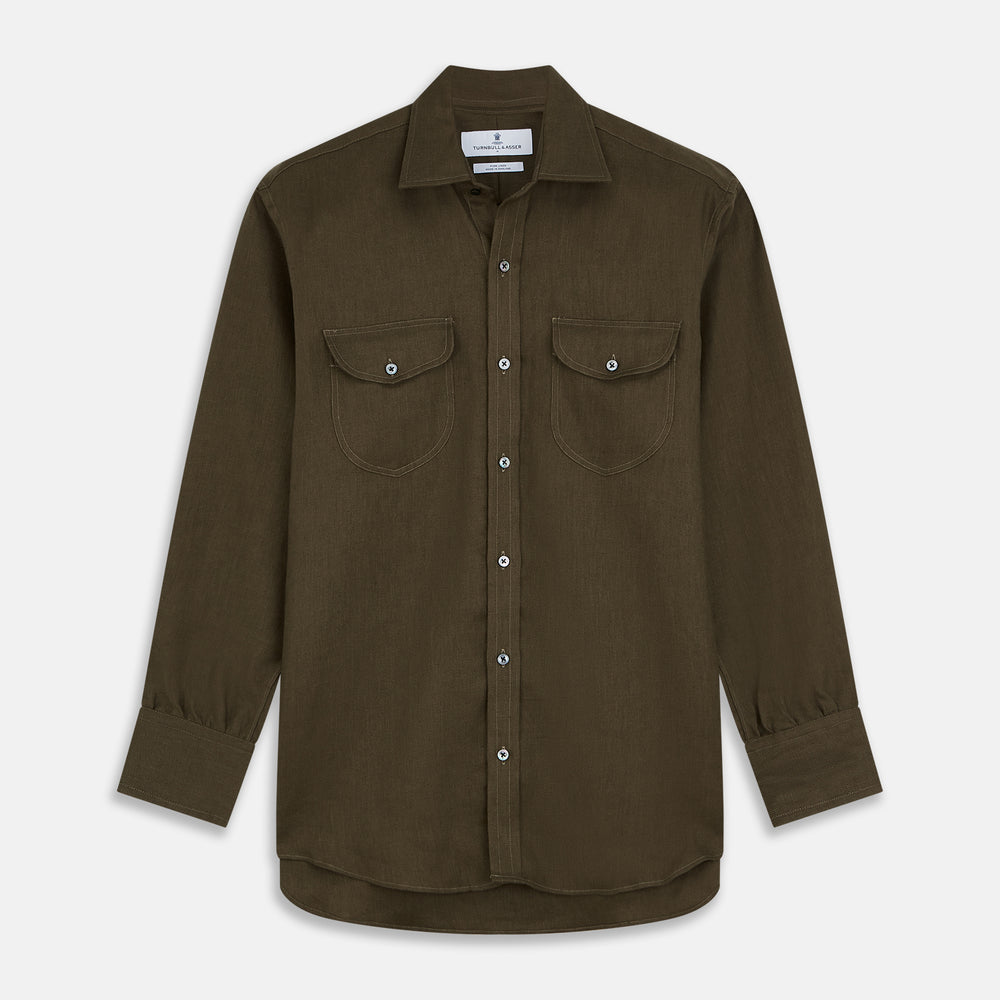 The Turnbull & Asser Khaki Green Linen Weekend Fit Langston Shirt features long sleeves, a classic Derby collar, two chest pockets, and buttoned cuffs, shown against a white background.