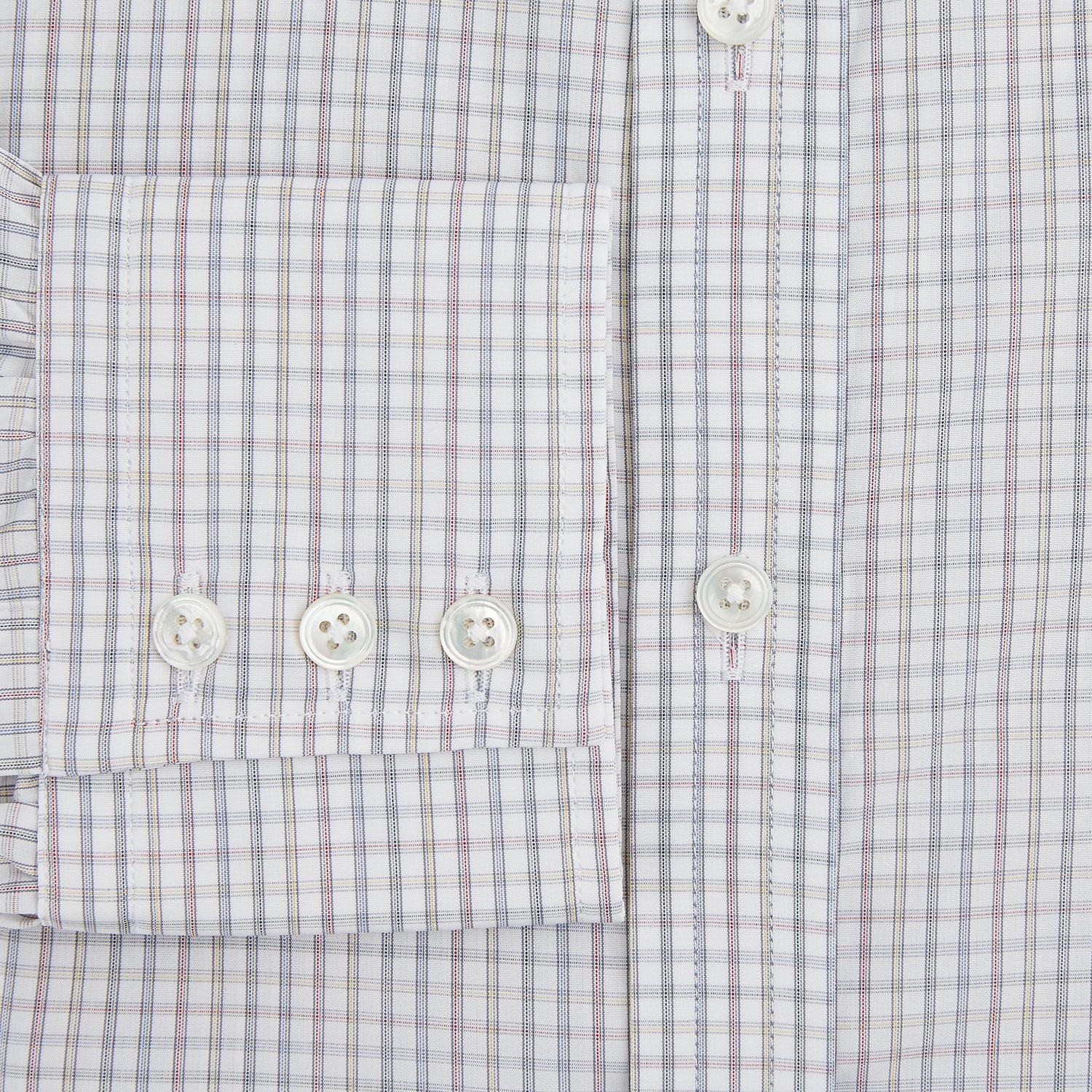View 4 of product The Turnbull & Asser Sky Blue Multi Graph Check Shirt features long sleeves, a button-up front, pointed T&A collar, buttoned cuffs, and a small blue-and-white check pattern, shown on a white background.