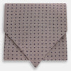 View 1 of product A folded, light-colored pocket square with small dark dots is displayed on a white background. Neatly arranged in a pointed fold, it pairs perfectly with the Turnbull & Asser Lilac and Navy Micro Dot Silk Cravat for an elegant look.