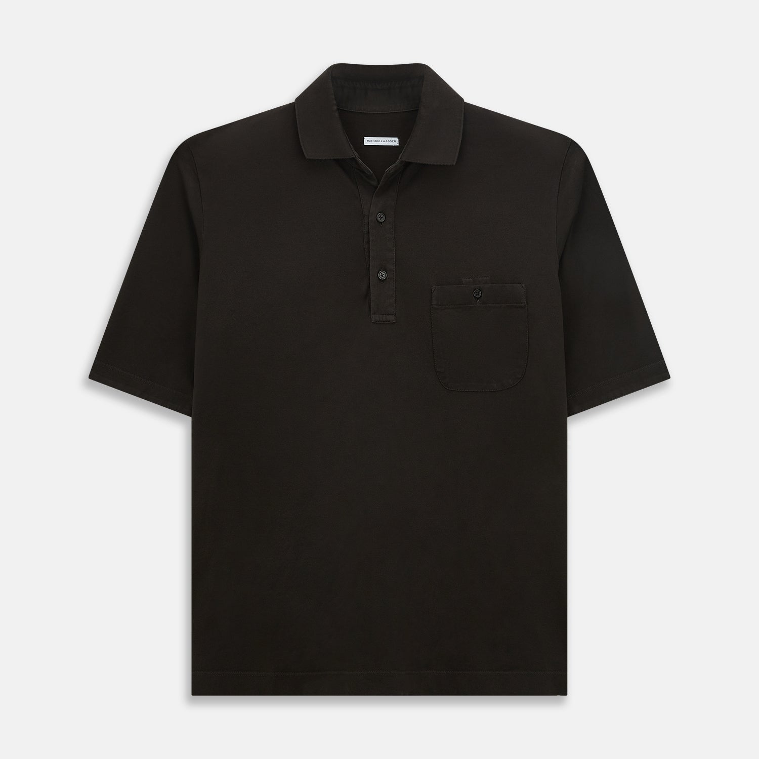 View 1 of product A brown cotton jersey polo shirt by Turnbull & Asser with short sleeves, a collar, three buttons, and a buttoned chest pocket, laid flat on a white background.