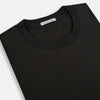 View 2 of product The Dark Chocolate Long-Sleeve T-shirt by Turnbull & Asser, featuring a plain crew neck design with no visible logos, is laid flat on a white background to showcase its quality and versatility.