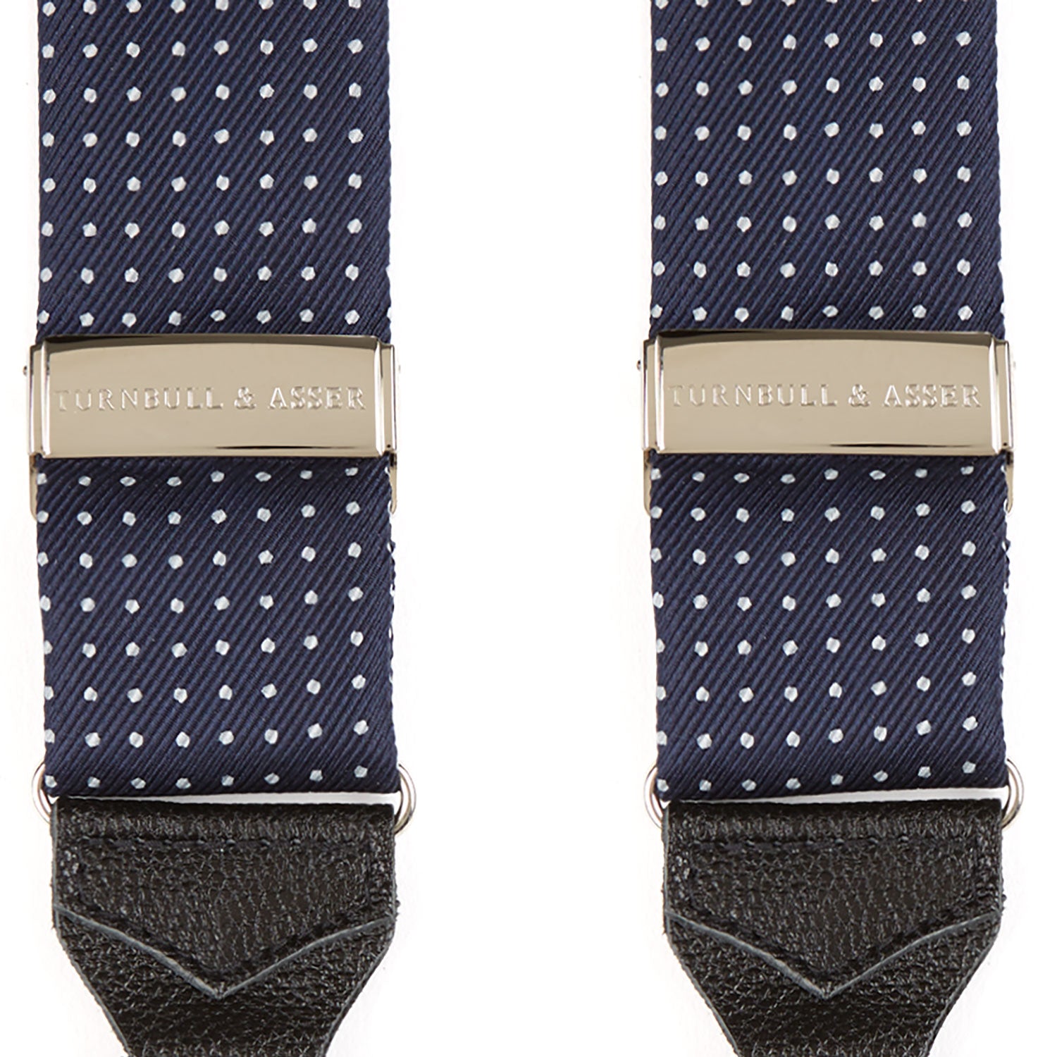 View 2 of product Turnbull & Asser Navy & White Small Spot Adjustable Silk Braces feature black leather loops and silver clasps—timeless accessories displayed on a white background.