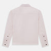 View 3 of product The Soft Pink Hyde Overshirt by Turnbull & Asser features long sleeves, sanforised cotton, dark buttons, and a left front pocket, shown laid flat on a white background.
