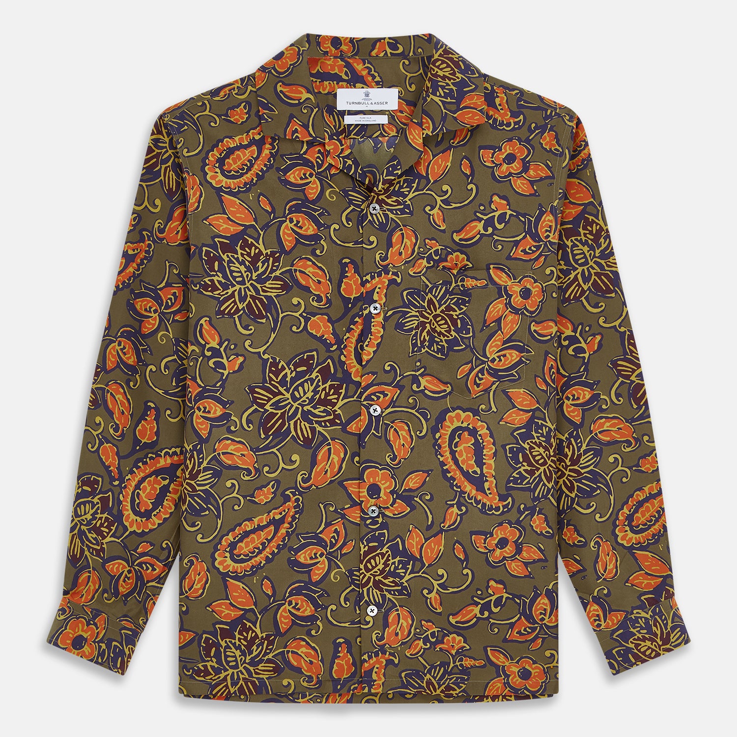 View 1 of product The Turnbull & Asser Khaki Green Floral Silk Holiday Fit Winnington Shirt features a bold floral print with orange, yellow, and purple on an olive background, plus a spread collar and chest pocket for versatile style.