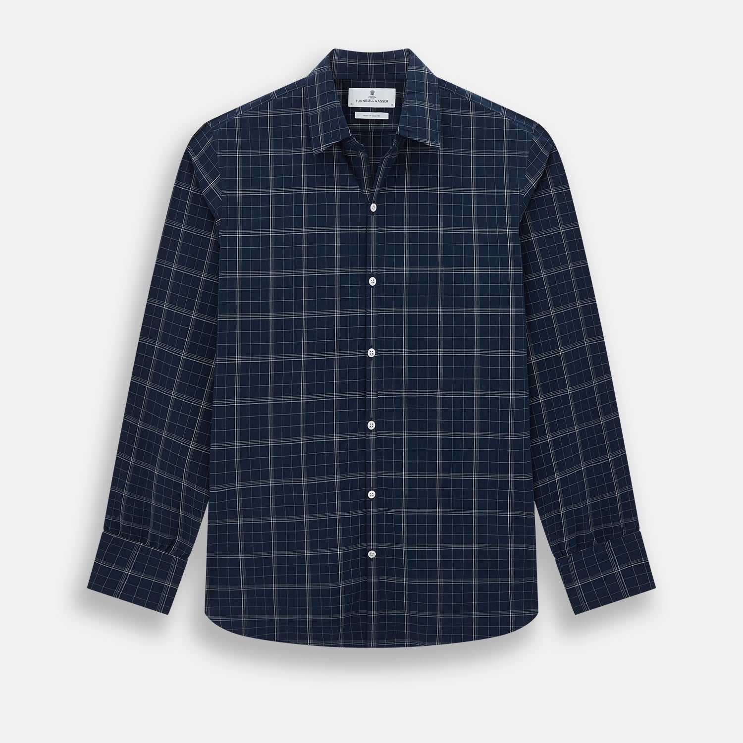 View 1 of product The Indigo and White Thin Plaid Check Windsor Shirt by Turnbull & Asser, a long-sleeve button-up with white buttons, is shown laid flat on a white background.