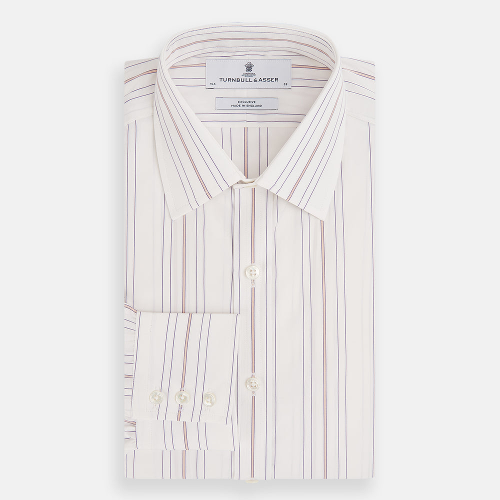 The Purple and Rose Multi Stripe Mayfair Shirt by Turnbull & Asser features thin blue, red, and gray stripes on white, a classic collar, and long sleeves. This British design is displayed on a plain white surface.