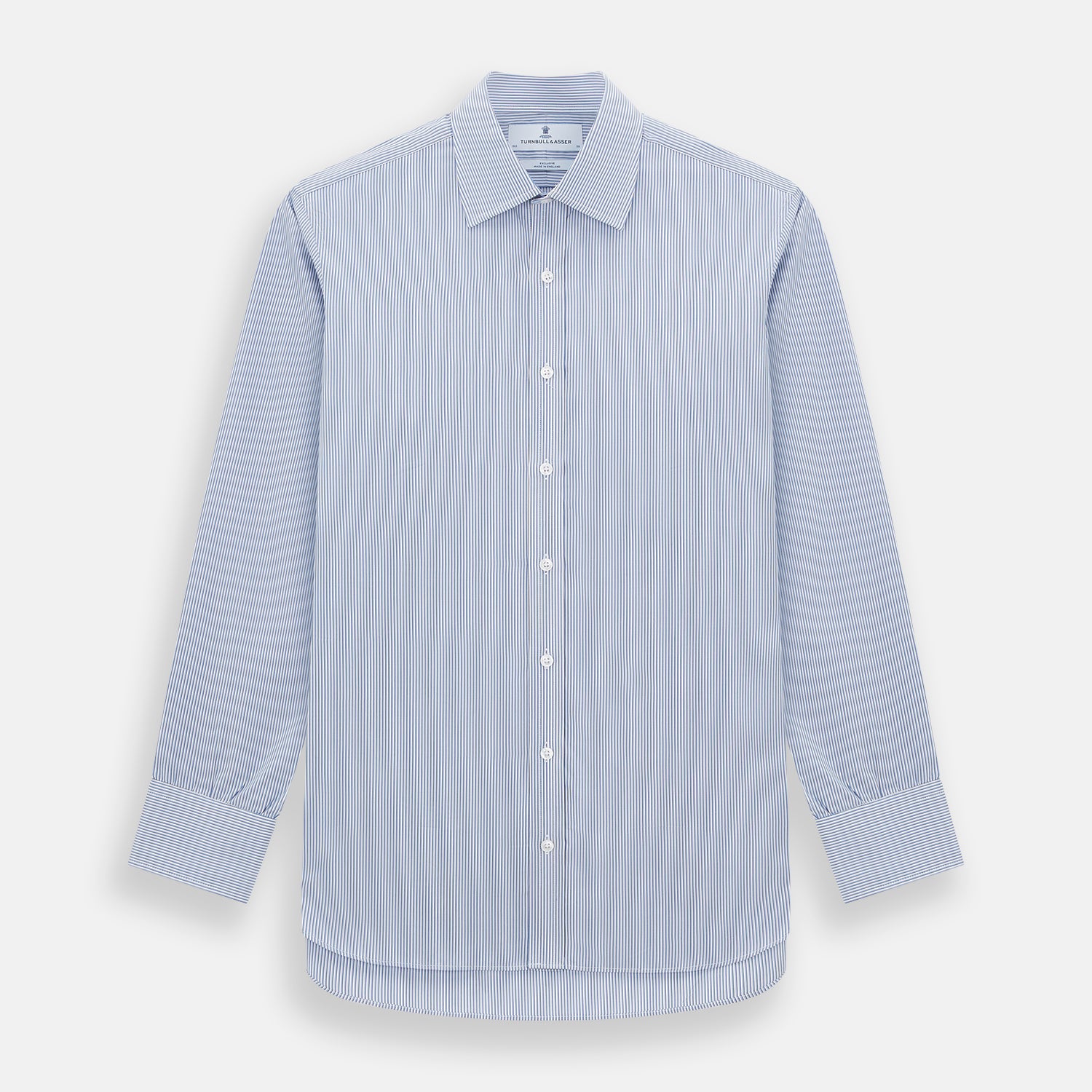 View 1 of product The Turnbull & Asser Pale Blue Pinstripe Mayfair Shirt features pale blue pinstripes, a classic T&A collar, white buttons, and cuffed sleeves, shown against a plain white background.
