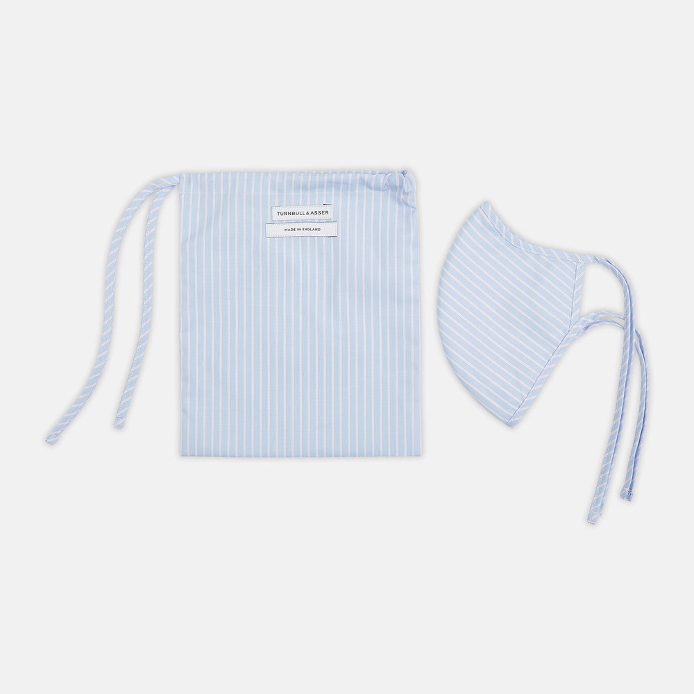 Turnbull & Asser's Exclusive Light Blue, White & Pink Stripe Commuter Mask features ear loops tied in bows and includes 3 VIROFORMULA™ filters for enhanced protection and comfort.