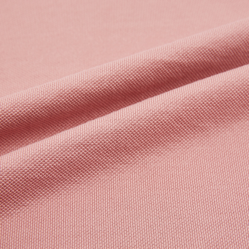 A Turnbull & Asser Red Rugby Polo Shirt with long sleeves, a collared neckline, v-neck opening, and no buttons is laid flat on a white background.