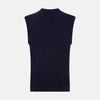 View 3 of product The Turnbull & Asser Navy Fine Merino V-Neck Vest is a sleeveless sweater exuding sophistication with its classic design, shown on a plain white background.