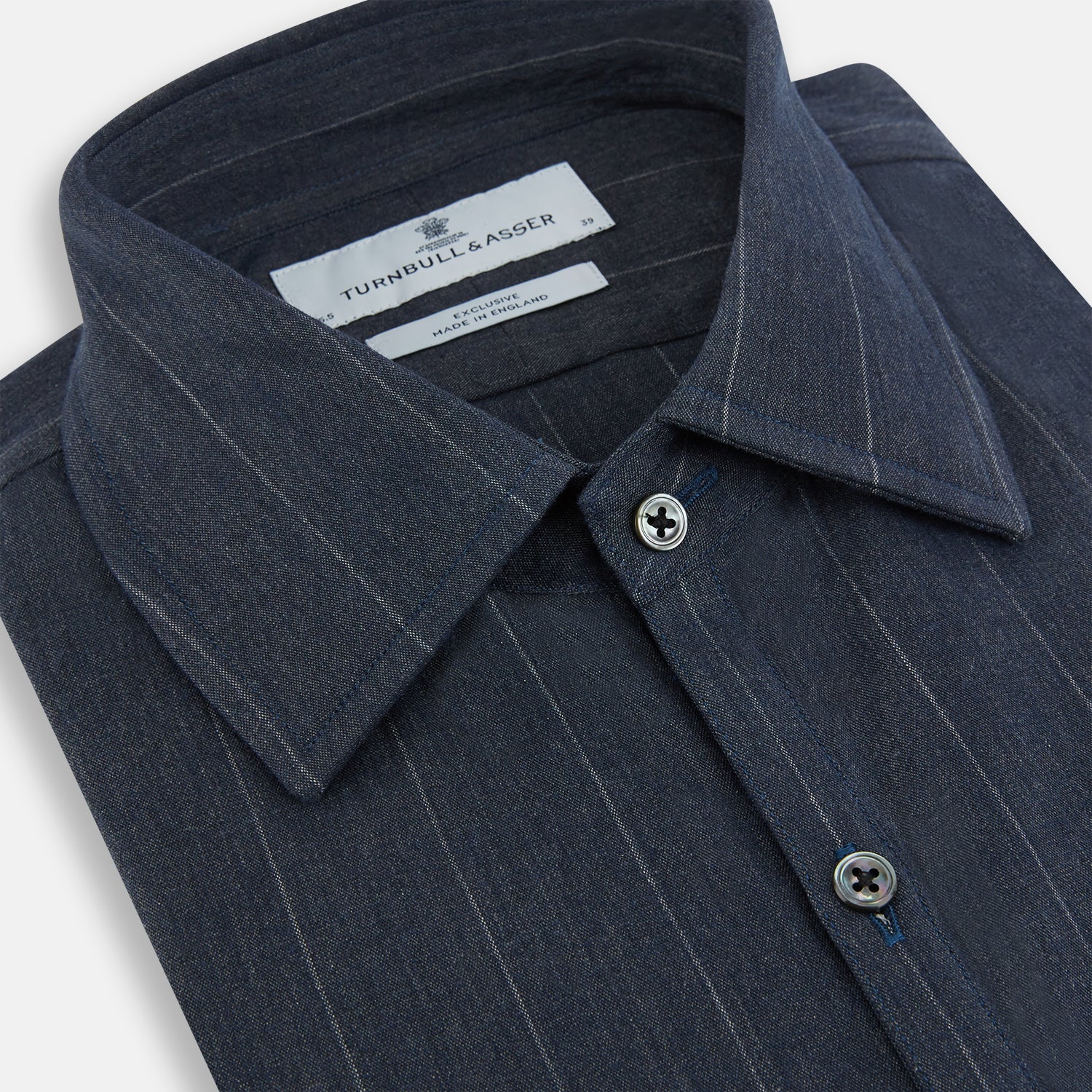 View 2 of product The Turnbull & Asser Navy Melange Wide Stripe Westminster Shirt features a classic collar, buttoned cuffs, and a tailored fit, showcasing British craftsmanship. Laid flat on a white background.