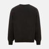 View 3 of product A plain, long-sleeved brown cashmere round neck jumper by Turnbull & Asser displayed on a white background. This men’s knitwear features ribbed cuffs, hem, and neckline with a relaxed fit and no visible patterns or logos.