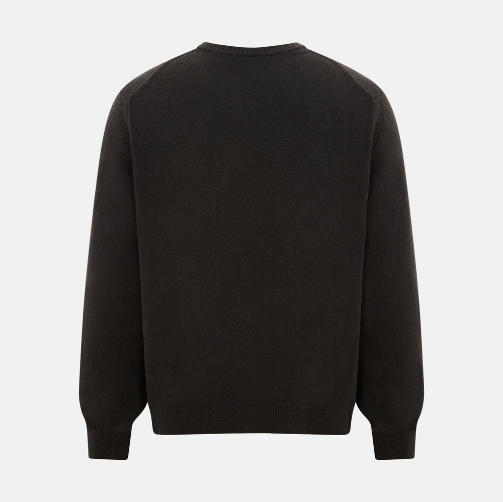 A plain, long-sleeved brown cashmere round neck jumper by Turnbull & Asser displayed on a white background. This men’s knitwear features ribbed cuffs, hem, and neckline with a relaxed fit and no visible patterns or logos.