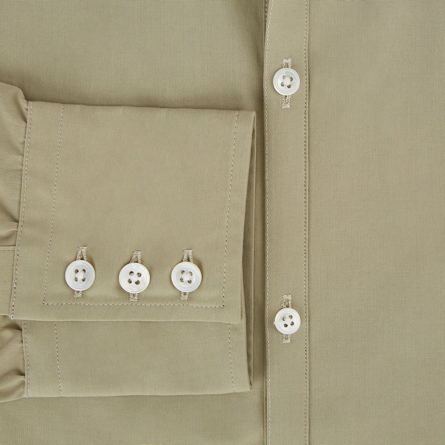 View 4 of product The TAUPE WINDSOR SHIRT by Turnbull & Asser features a Windsor collar and buttoned cuffs. This long-sleeve shirt showcases refined British design and is displayed flat on a white background.